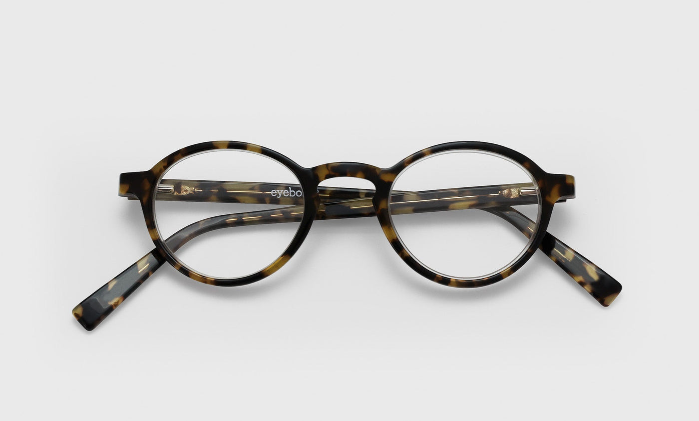 T1_eyebobs premium designer board stiff readers, blue light and prescription glasses in tortoise front with black & tortoise temples, laydown