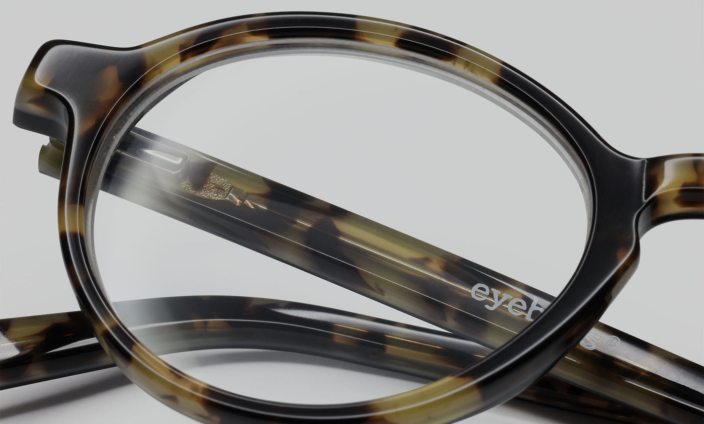 T1_eyebobs premium designer board stiff readers, blue light and prescription glasses in tortoise front with black & tortoise temples, macro