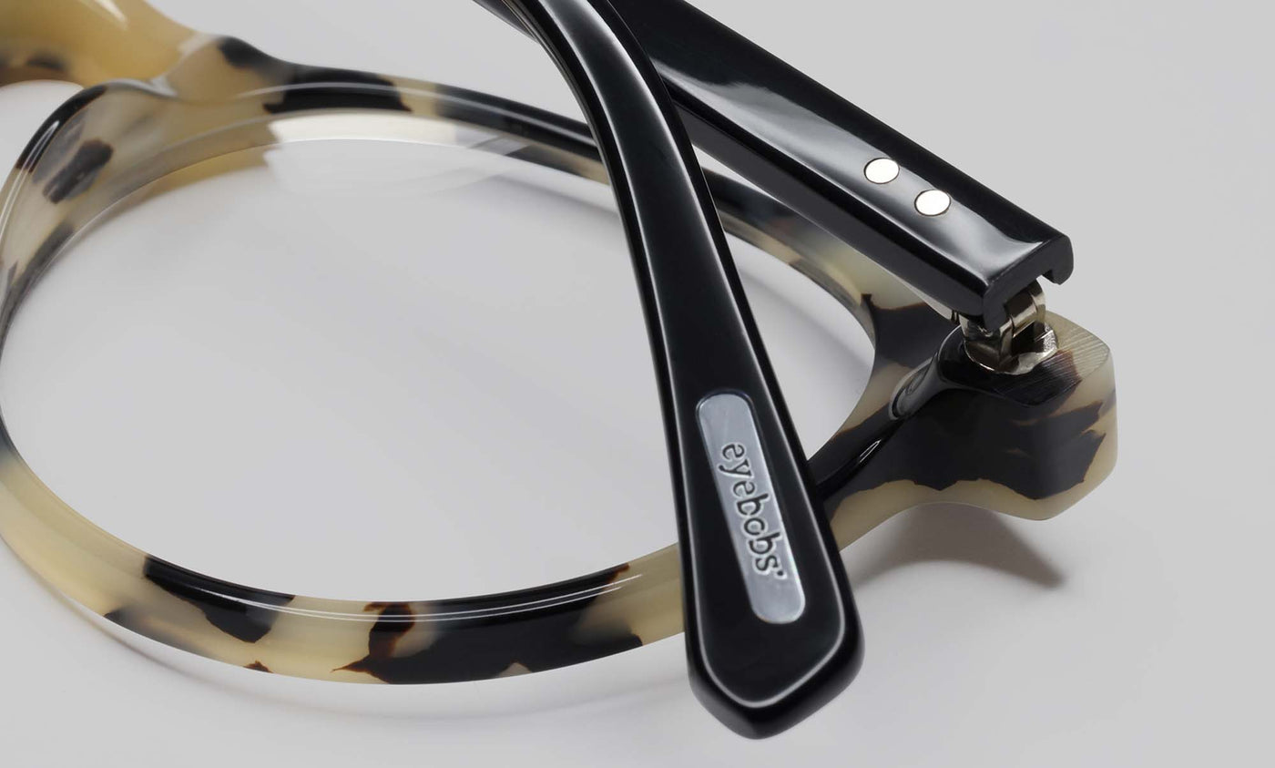 21_eyebobs premium designer case closed readers, blue light and prescription glasses in black & white