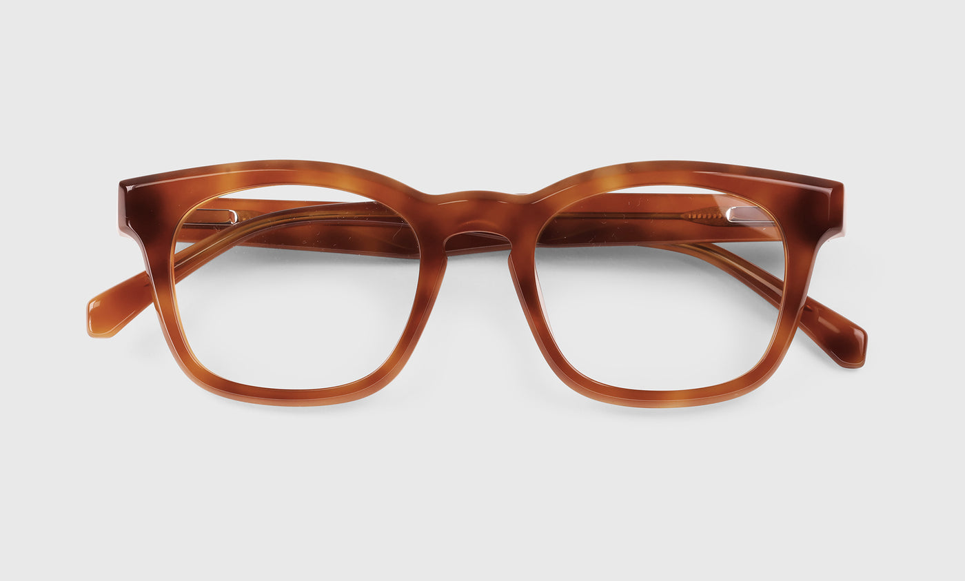 04 | Humble Narrator laydown eyeglass frames on neutral background.