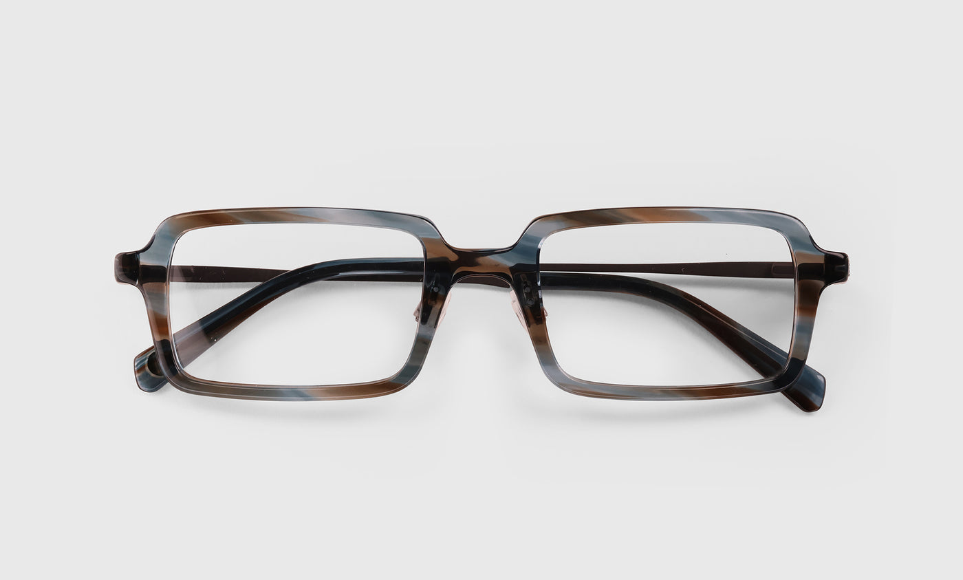 11 | Mogul laydown eyeglass frames on neutral background