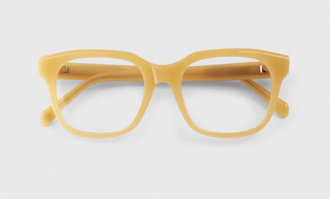 77 | Nomad lay down eyeglass fames on neutral background