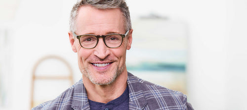 headshot of man over 50 wearing glasses