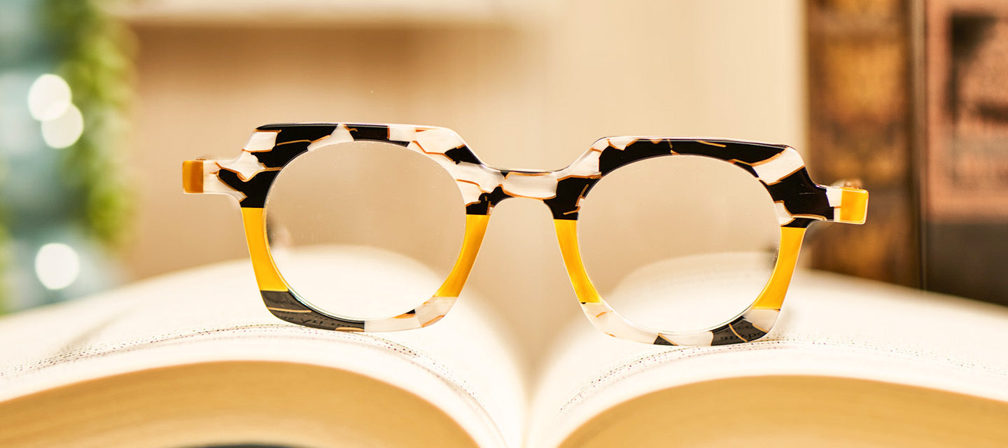 turtle shell geometric frames resting on an open book