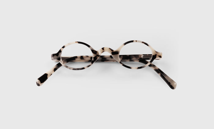  Old Money lay down eyeglass frames on neutral background