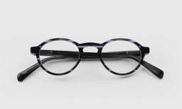 07 | Board Stiff lay down eyeglass frames on neutral background