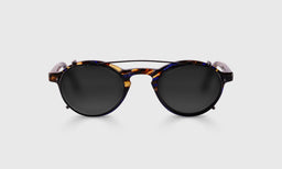 gallery position 1 front view of round tortoiseshell Board Stiff clip-on sunglasses with black polarized lenses on gray background