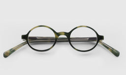 P. Body reading glasses featuring italian-designed acetate frame in soft green hues with scratch resistant lenses