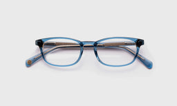 eyebobs thin rectangle eyeglasses in Blue Crystal, laid flat with temples visible