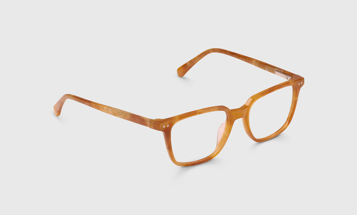  C Suite angle eyeglass frames on neutral background.