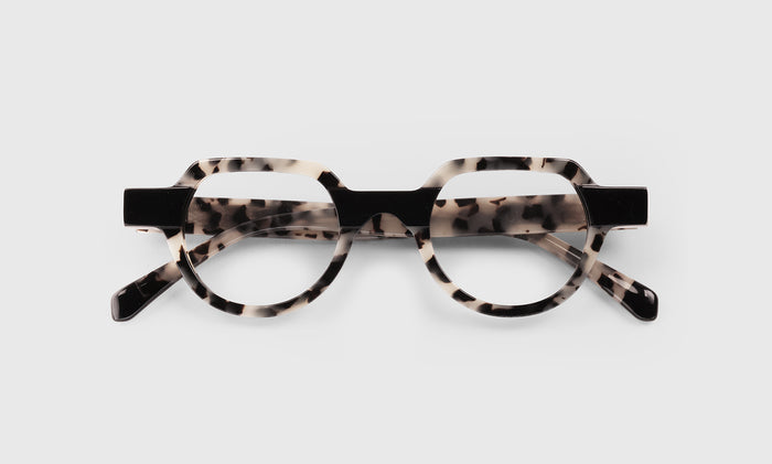  Knock Out laydown eyeglass frames on neutral background