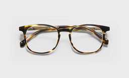 86_eyebobs premium designer board room readers, blue light and prescription glasses in brown demi stripe