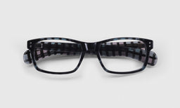 09 | eyebobs Roy D lay down eyeglass frames on neutral background
