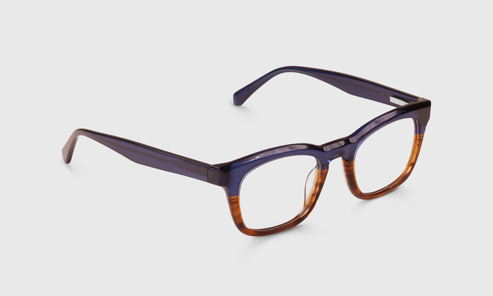  Humble Narrator angle eyeglass frames on neutral background.