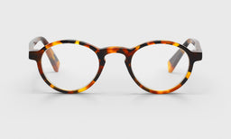 Board Stiff reading glasses featuring italian-designed acetate, tortoise shell pattern, and scratch resistant lenses