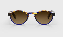 Board Stiff Sunglasses with italian-designed acetate frame in tortoise and blue, featuring polarized brown scratch resistant lenses
