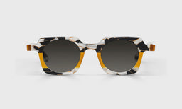 Chutzpah'd Sunglasses with italian-designed acetate frame in bold black, white, and yellow pattern and polarized grey lenses