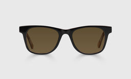 00-pb | The Director brown polarized sunglass frames on neutral background