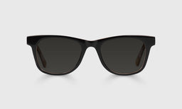 00-pg | The Director grey polarized sunglass frames on neutral background