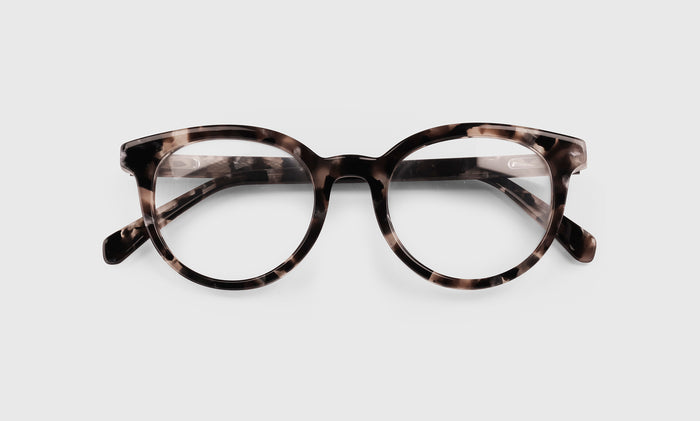  Rush Hour lay down eyeglass frames on neutral background
