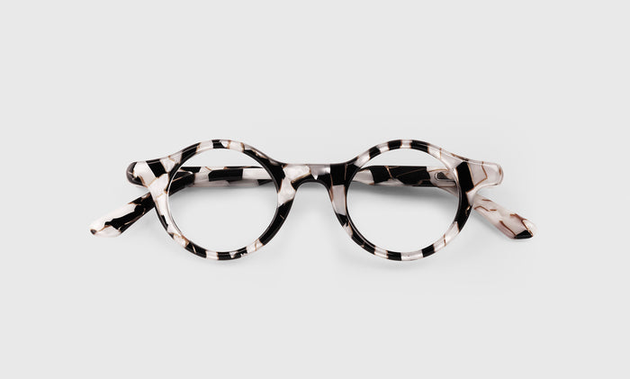  Eye Candy lay down eyeglass frames on neutral background