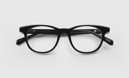 00 | Class Act lay down eyeglass frames on neutral background