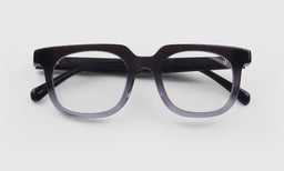 00 | Overachiever lay down eyeglass frames on neutral background