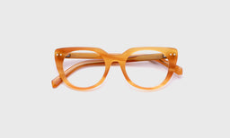 eyebobs round eyeglasses in Caramel Demi, laid flat with temples visible
