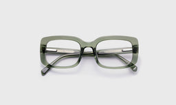 eyebobs bold wide square eyeglasses in Green Crystal, laid flat with temples visible