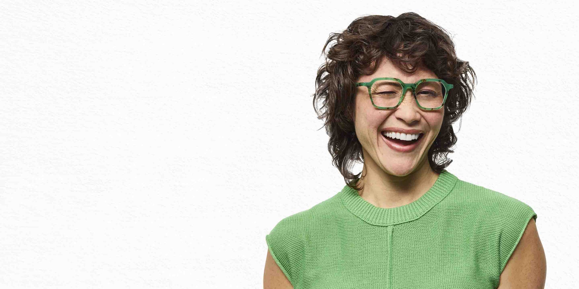 Female Model Wearing Frames Four Square in Jade Tortoise