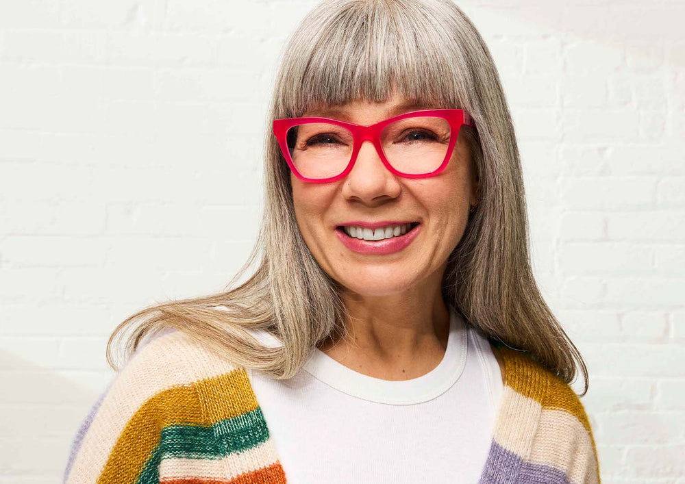 Female Model Wearing Frames Kitten Around in Pink