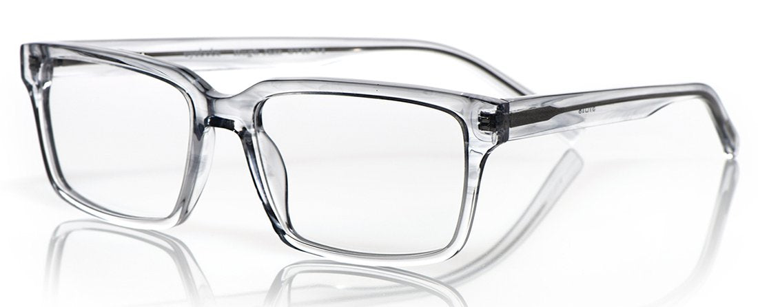 Large transparent grey acetate rectangular eyeglasses with wide frames and glossy finish on a white reflective surface