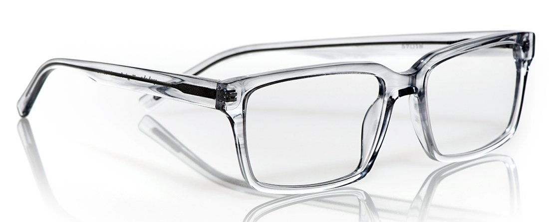 Wide transparent grey acetate rectangular eyeglasses with oversized frames and a polished glossy finish on a reflective white surface