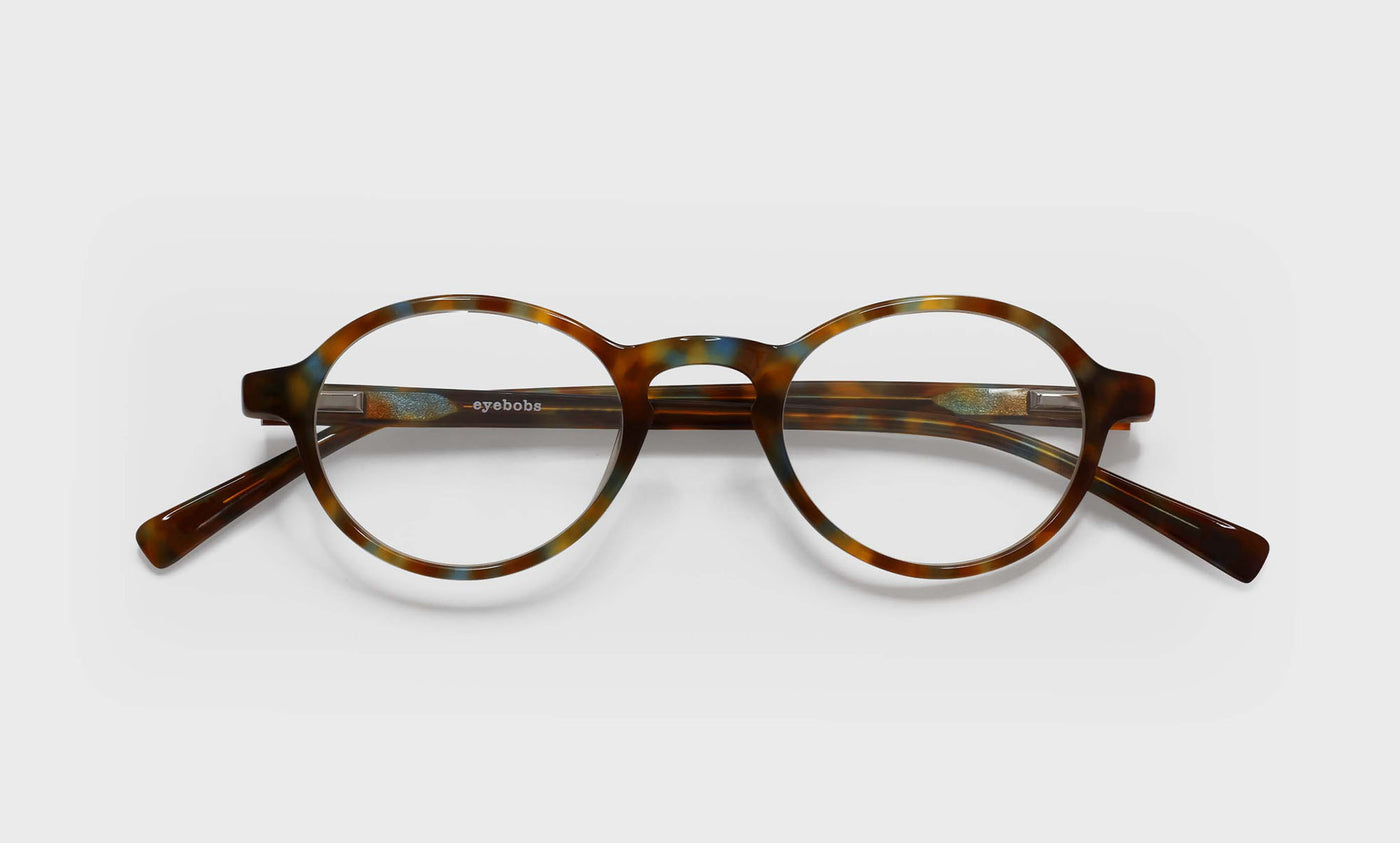 16_eyebobs premium designer board stiff readers, blue light and prescription glasses in spotty blue tortoise
