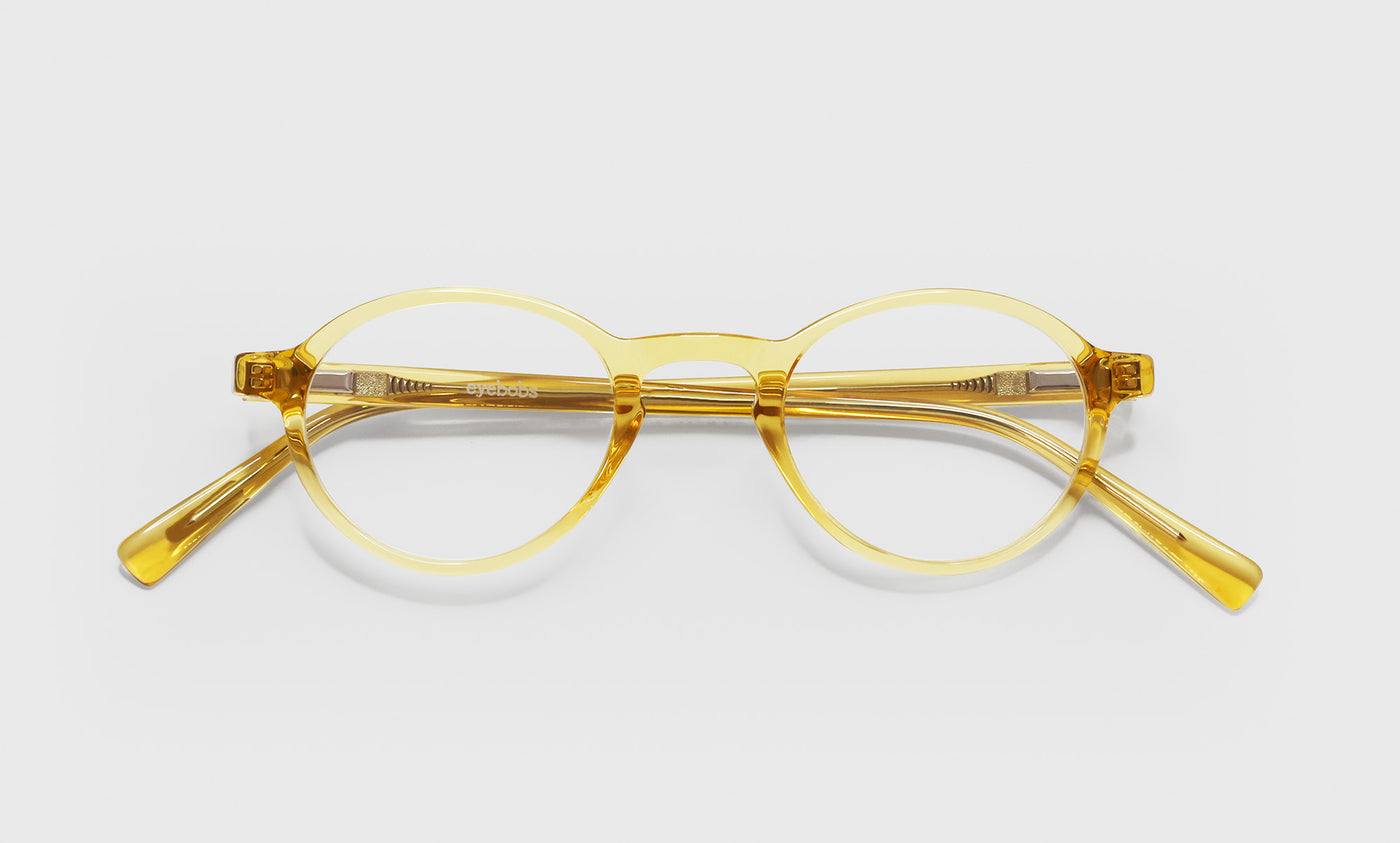 77_eyebobs premium designer board stiff readers, blue light and prescription glasses in orange crystal, laydown