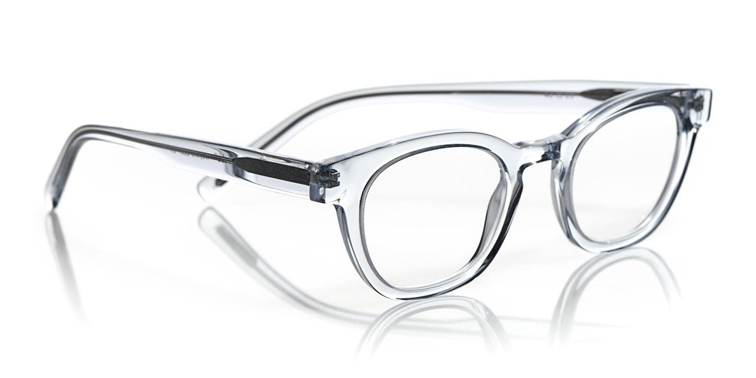 Transparent blue crystal acetate eyeglasses with shiny finish and retro-inspired rounded square frame on white background