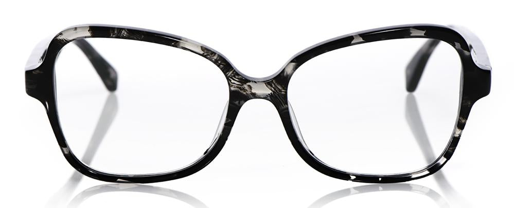 Women's wide black tortoise glossy acetate eyeglasses with bold square frames on reflective white surface