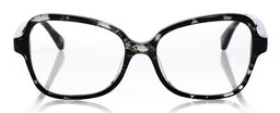 Women's wide black tortoise glossy acetate eyeglasses with bold square frames on reflective white surface