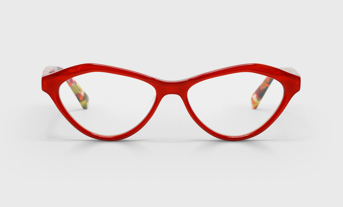 Wide women's cat-eye eyeglasses with bright red front frame and red chop-patterned temples on a light gray background