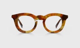 Unisex round eyeglasses with marbled orange acetate frame front and temples on a pale gray background
