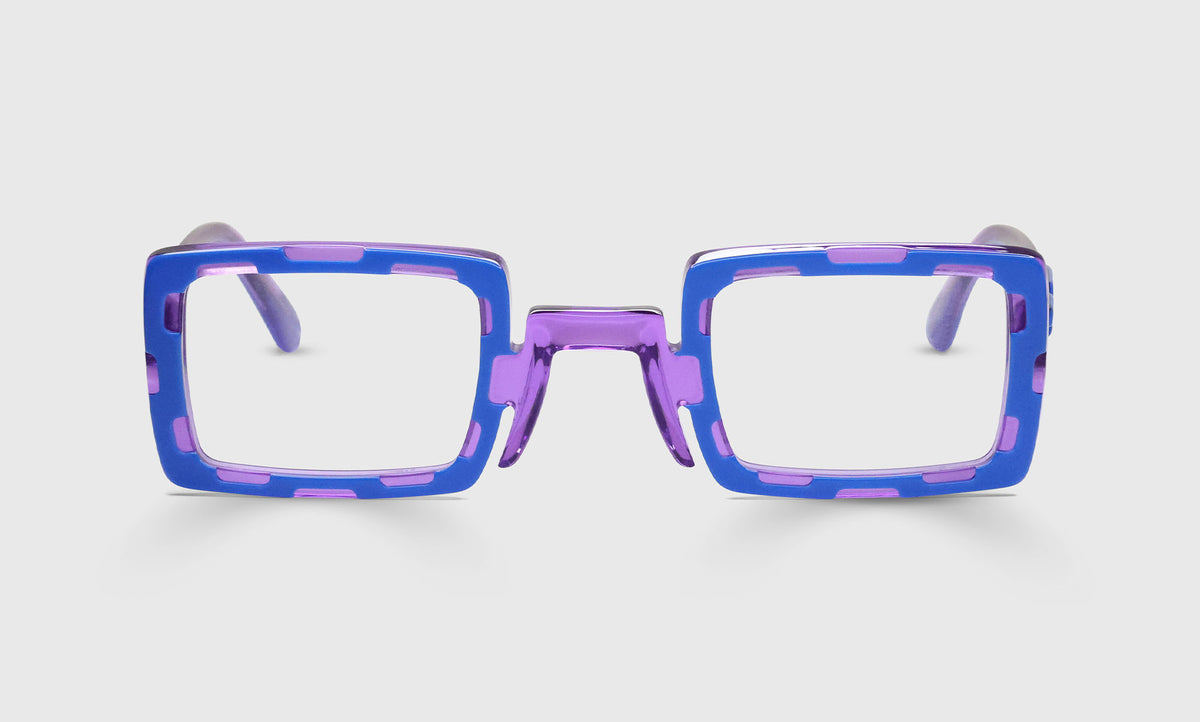 Rectangular eyeglasses with layered azure and crystal violet frames featuring a dimensional cut-out design on light background