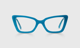 Cat-eye eyeglasses with solid teal acetate frame and temples displayed on a light gray background