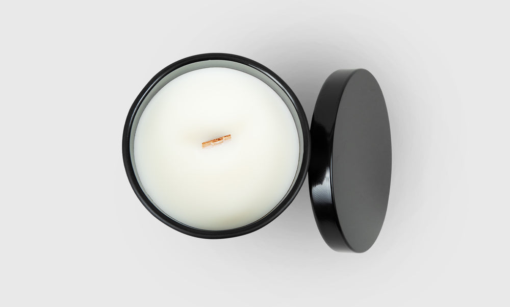 gallery position 1 Excelsior Candle Co. soy wax candle with wooden wick in black reusable container and lid on plain light gray background
